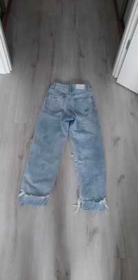 Spodnie jeansowe szerokie z dziurami