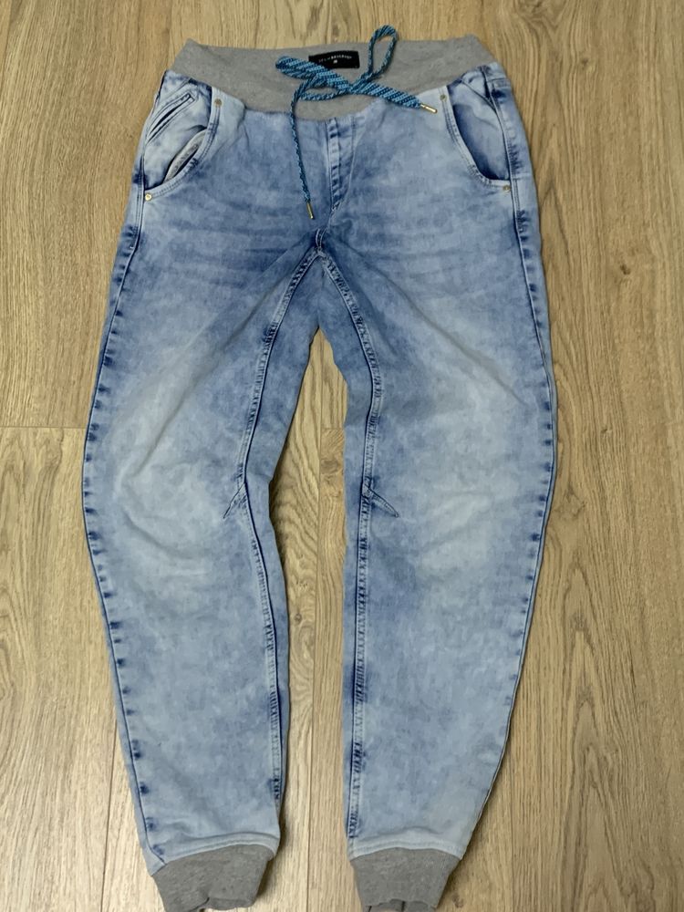 Spodnie jeansowe baggy Reserved 38