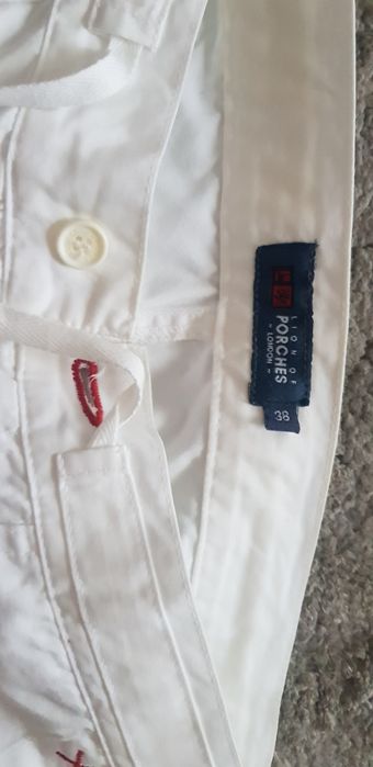 Calças lion of porches