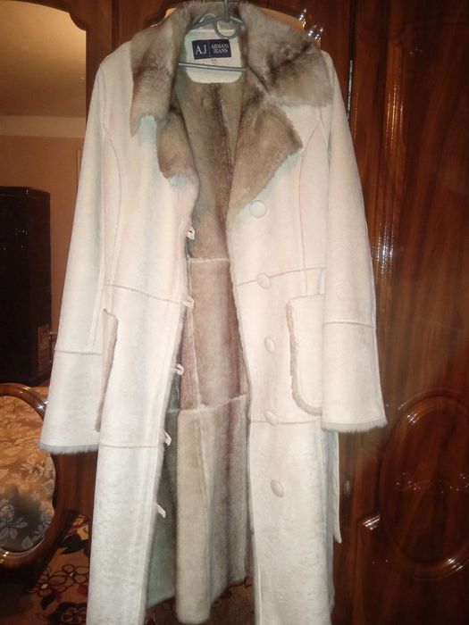 Пальто для жінки