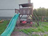 Domek drewniany z piaskownica