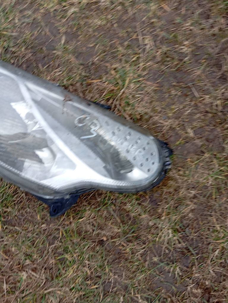 Lampa reflektor lewy przód Citroen C3 Plurier Oryginał Europa