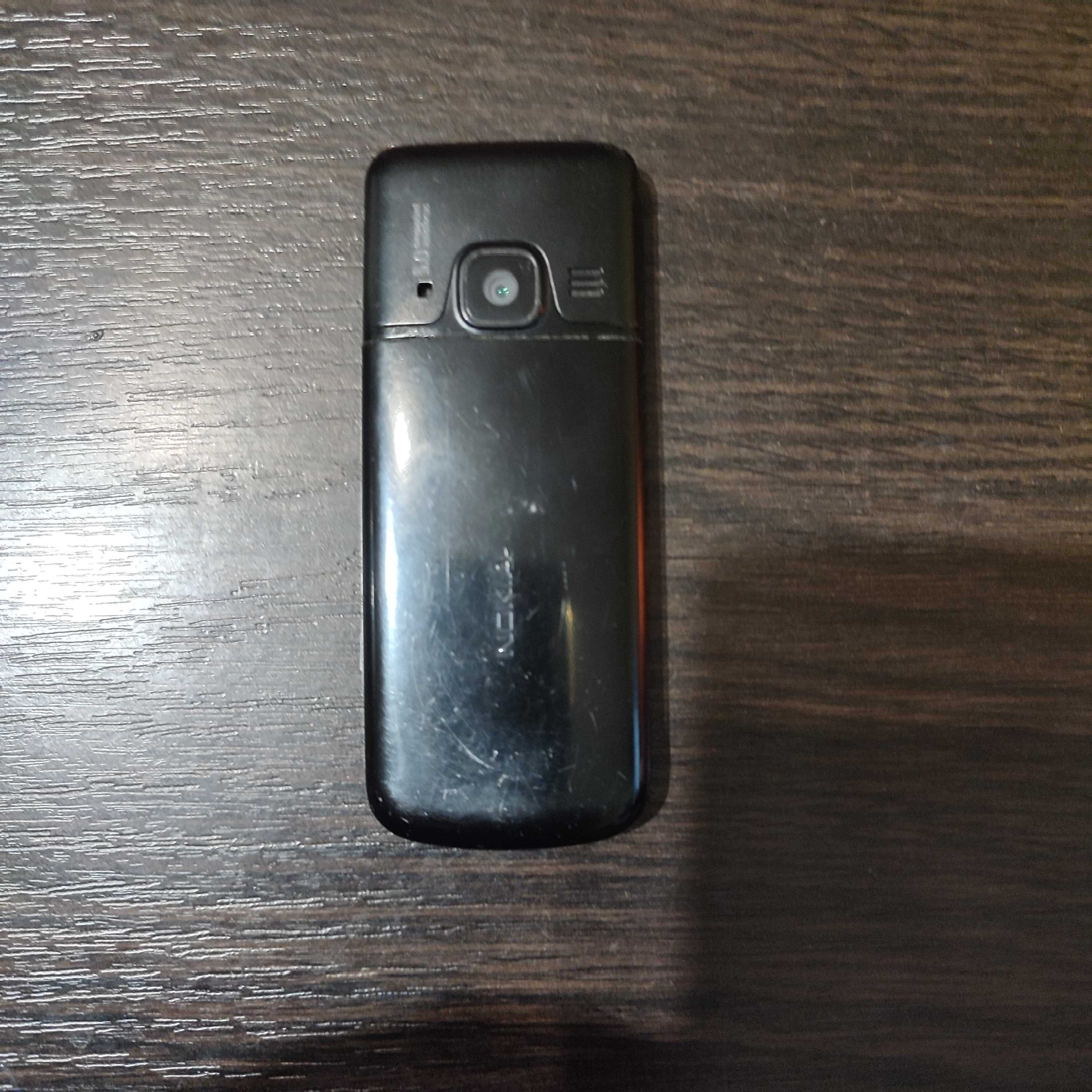 Nokia 6700 Black с зарядным устройством родным.