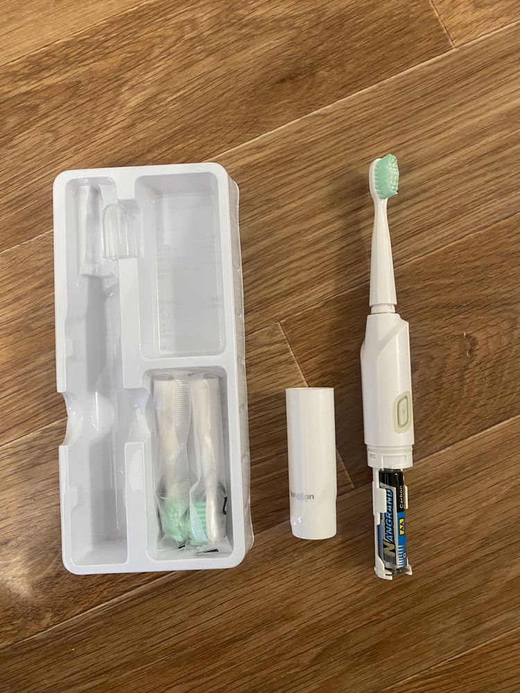 Електрична зубна щітка Langtian + 3 насадки (біла та рожева)