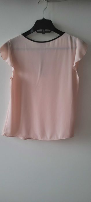 Blusa completamente nova