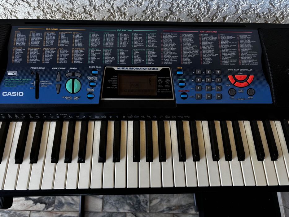 Órgão Cásio CTK-511 com bolsa e suporte metálico