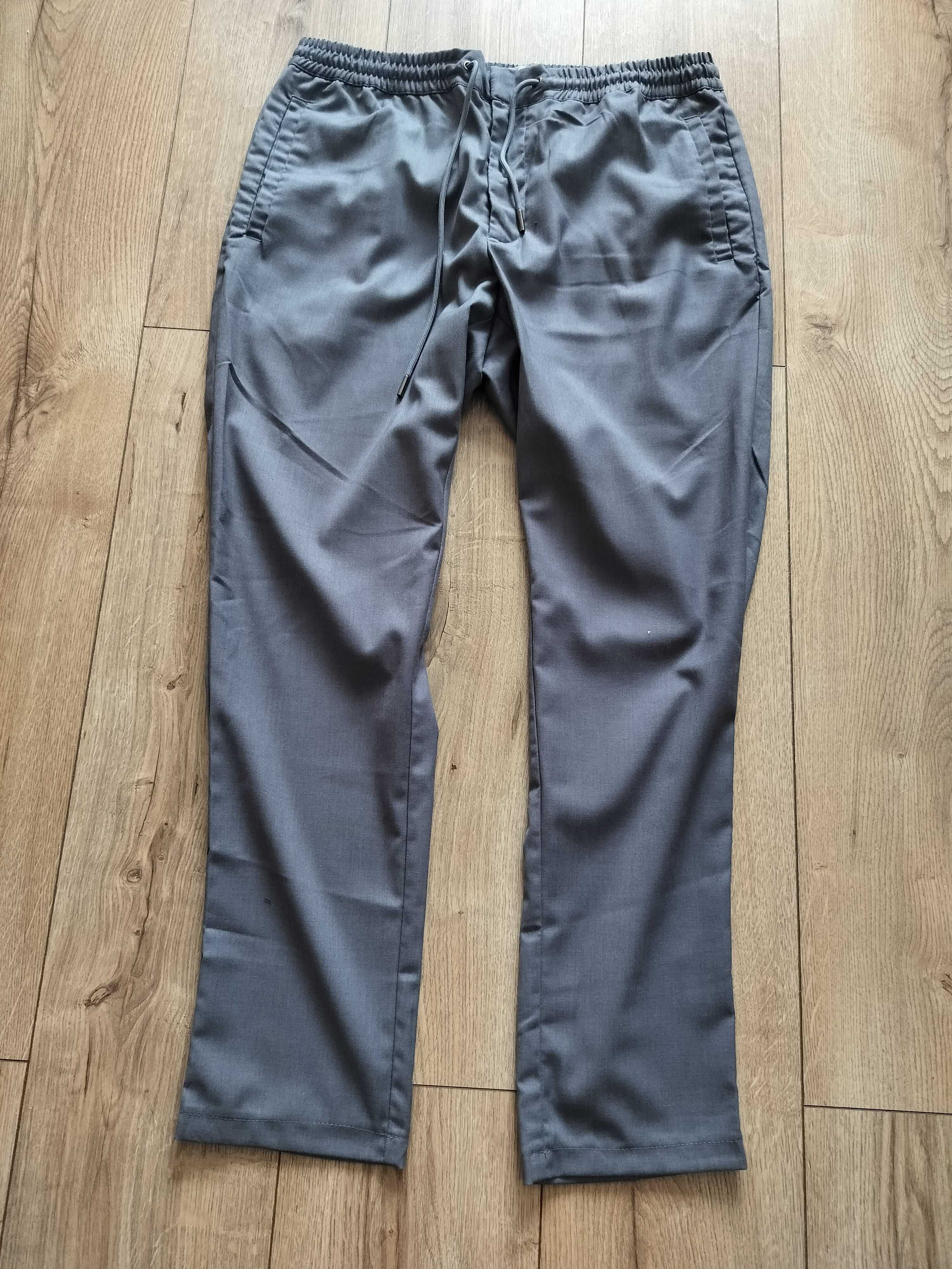 Spodnie damskie 42 Reserved joggery elastyczne praktyczne super pas90