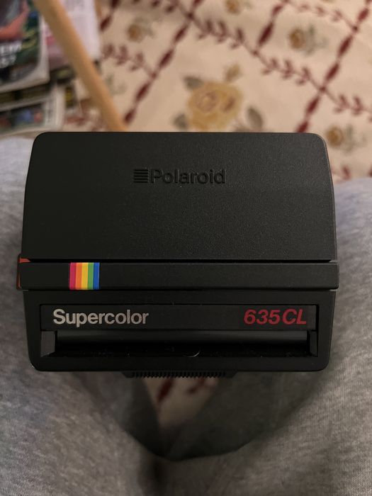 Polaroid Camera + carrying case.64552091102593120