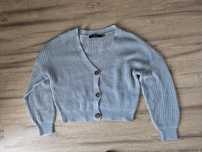 Sweter rozpinany vero moda błękitny M
Dekolt w serek
Normalne ślady uż