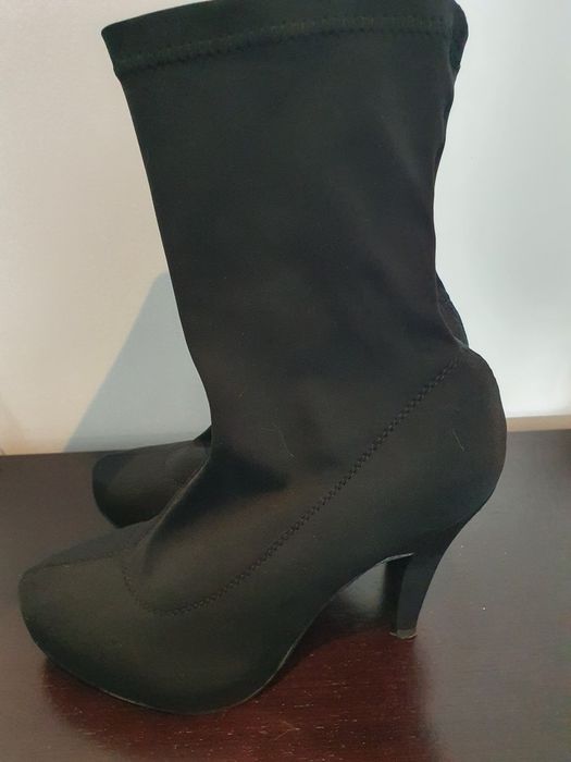 Botas salto alto, cano maleável