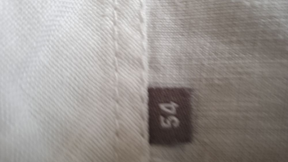 Білі широкі льняні брюки. we