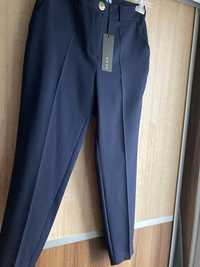 Granatowe spodnie cygaretki Edan M i L