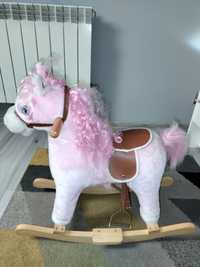 Koń na biegunach różowy