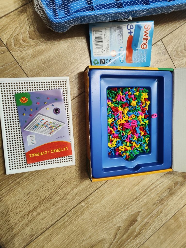 Nowa huśtawka i zabawka edukacyjna