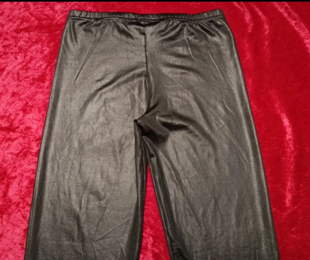 Nowe czarne legginsy ala skórzane, błyszczące, rozmiar XS
Wymiary mier