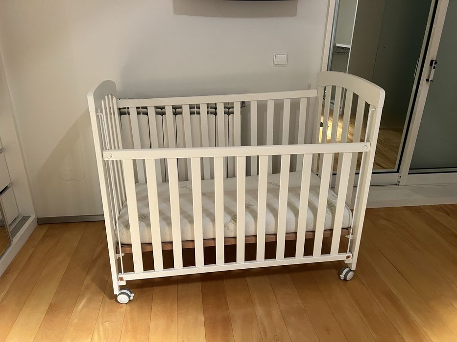 Berço a precisar reparação (roda)