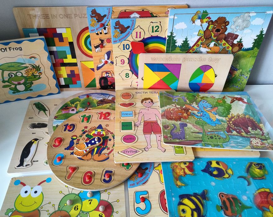 Дерев'яні іграшки пазли і вкладиші, вставки.