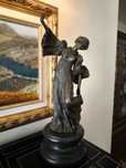 Escultura em bronze