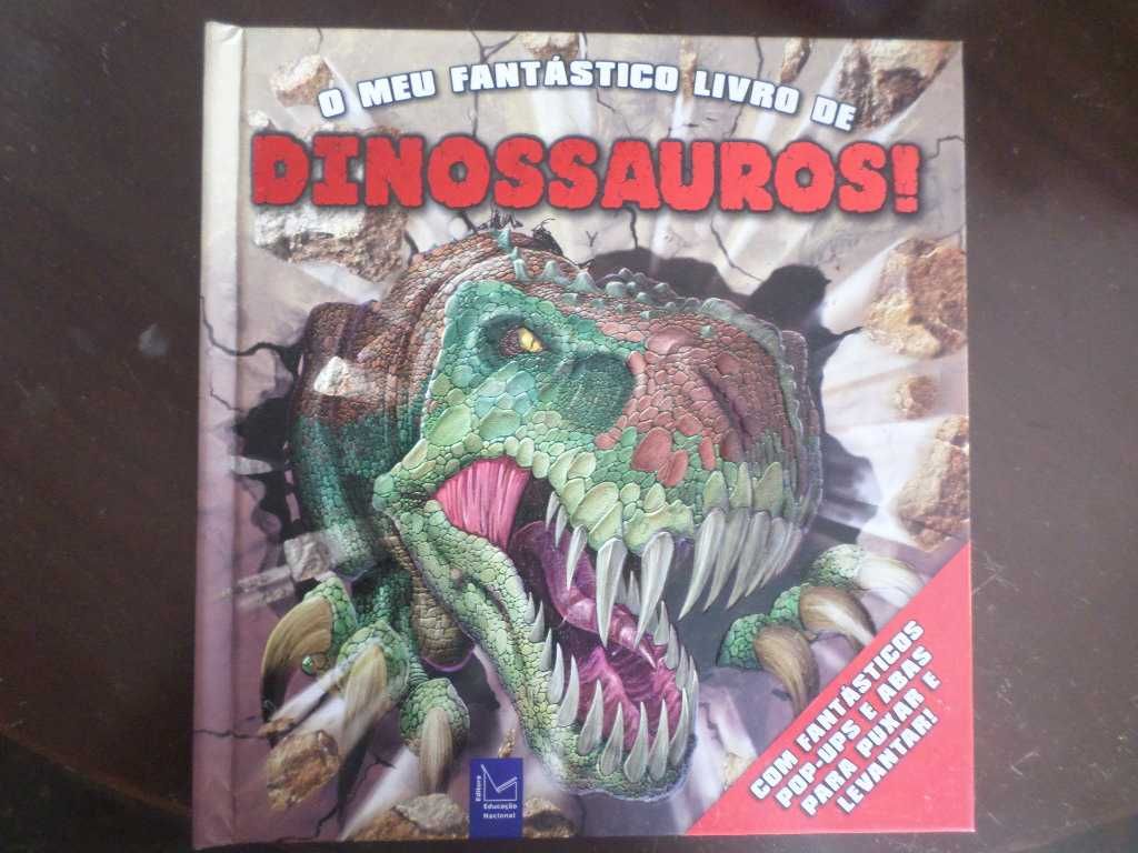 Livros infantis, dinossauros e outros