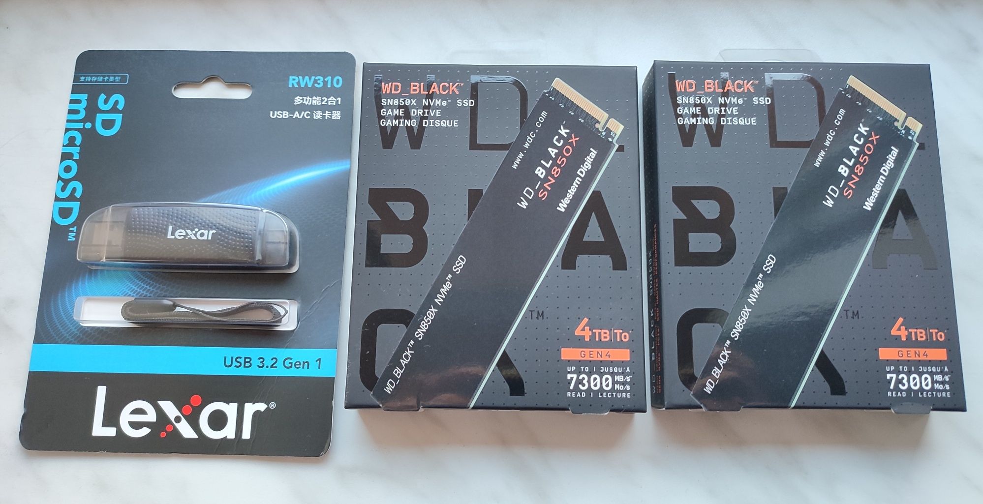 Lexar czytnik kart SD + dwa dyski SSD: WD Black SN850X GAME DRIVE 4TB.