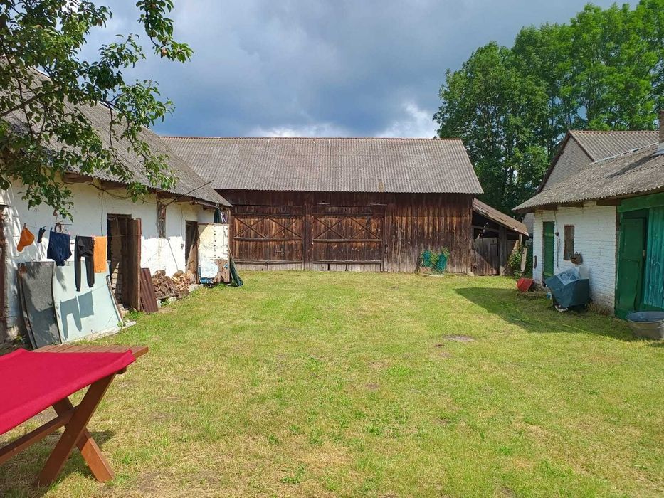 dom z działką i zabudowaniami gospodarczymi