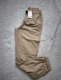 Nowe letnie spodnie tkaninowe coccodrillo r. 164