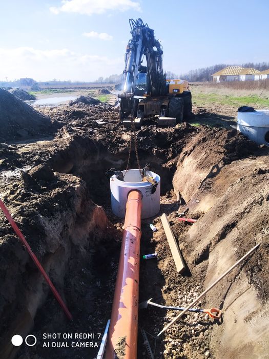 Usługi koparką wynajem Mecalac Brukarstwo.