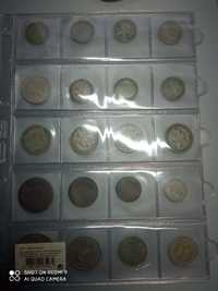 Moedas de 1 escudo + 50 centavos + moedas espanholas e outras