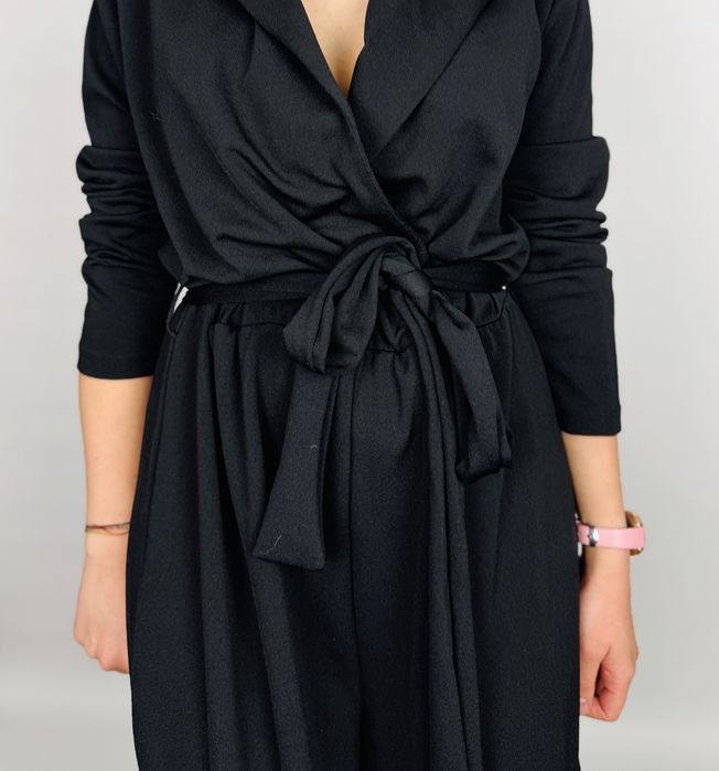 Czarny elegancki kombinezon z wiązaniem w talii L 40