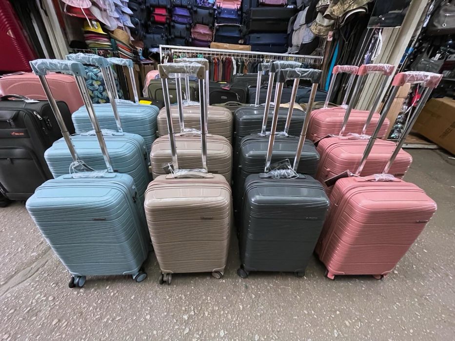 Чемоданы ткань и полипропилен