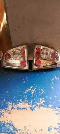 Lampy tylne Opel Astra g