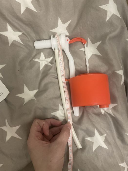 Наповальний механізм бачка унітазу з боковим наповненням, поплавок