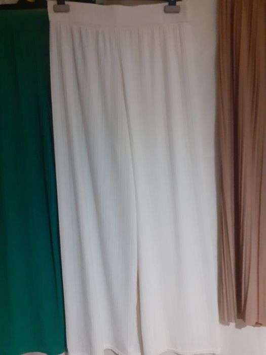 Calças/ pantanolas  tm L semi-novas usadas1vez.