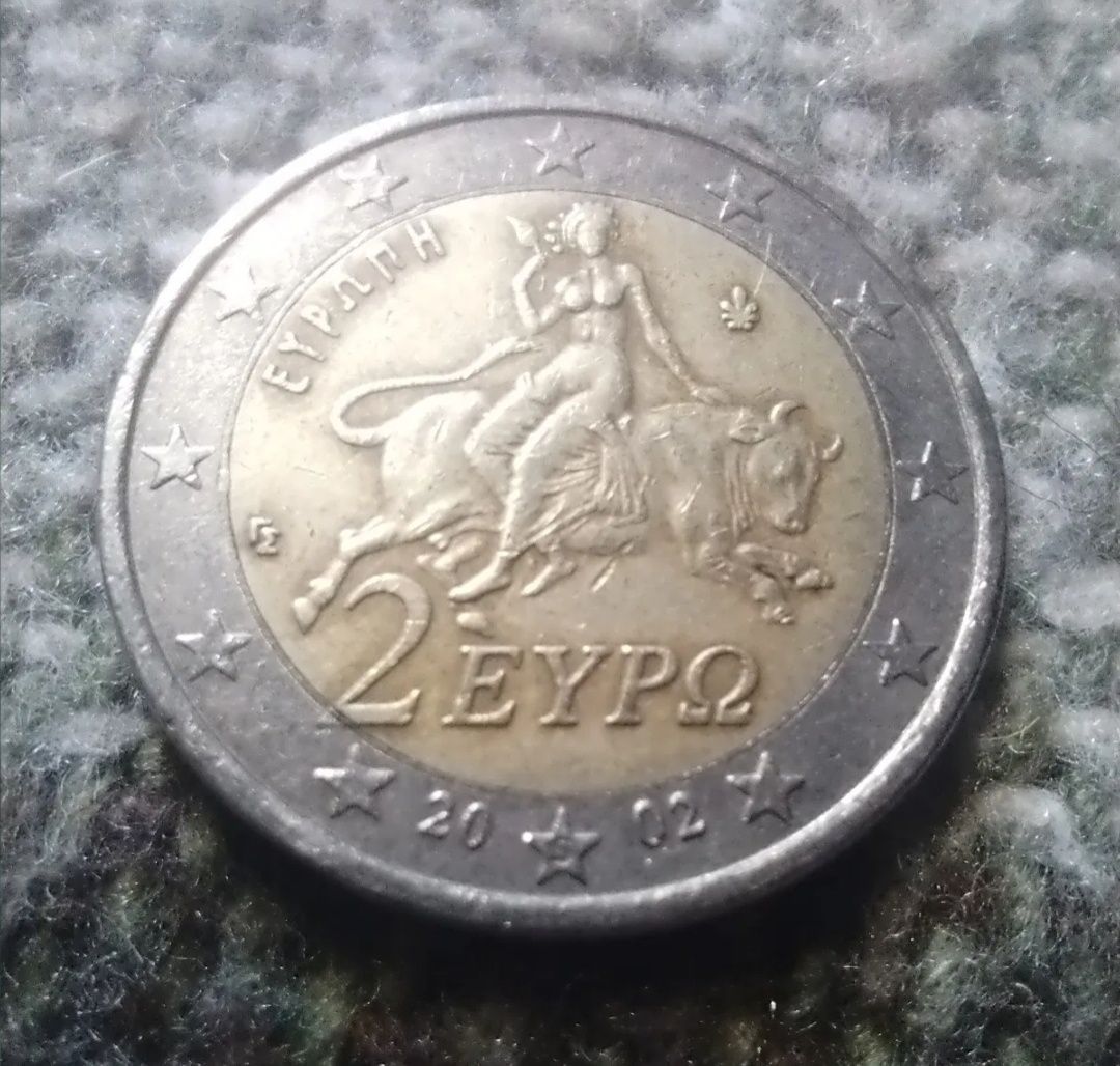 Продам коллекционые 2 евро Греция 2002г, с буквой S в нижней звезде