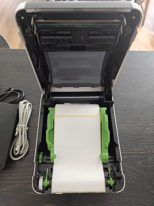 Drukarka termiczna Brother TD-4210D + 2 rolki etykiet (550+)