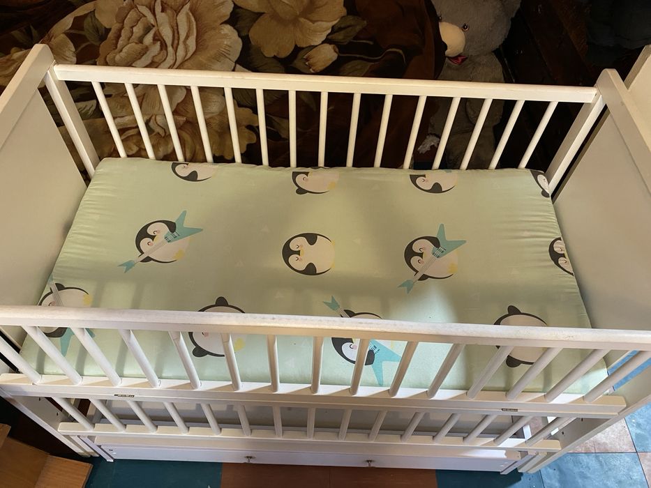 Дитяче ліжечко на маятнику