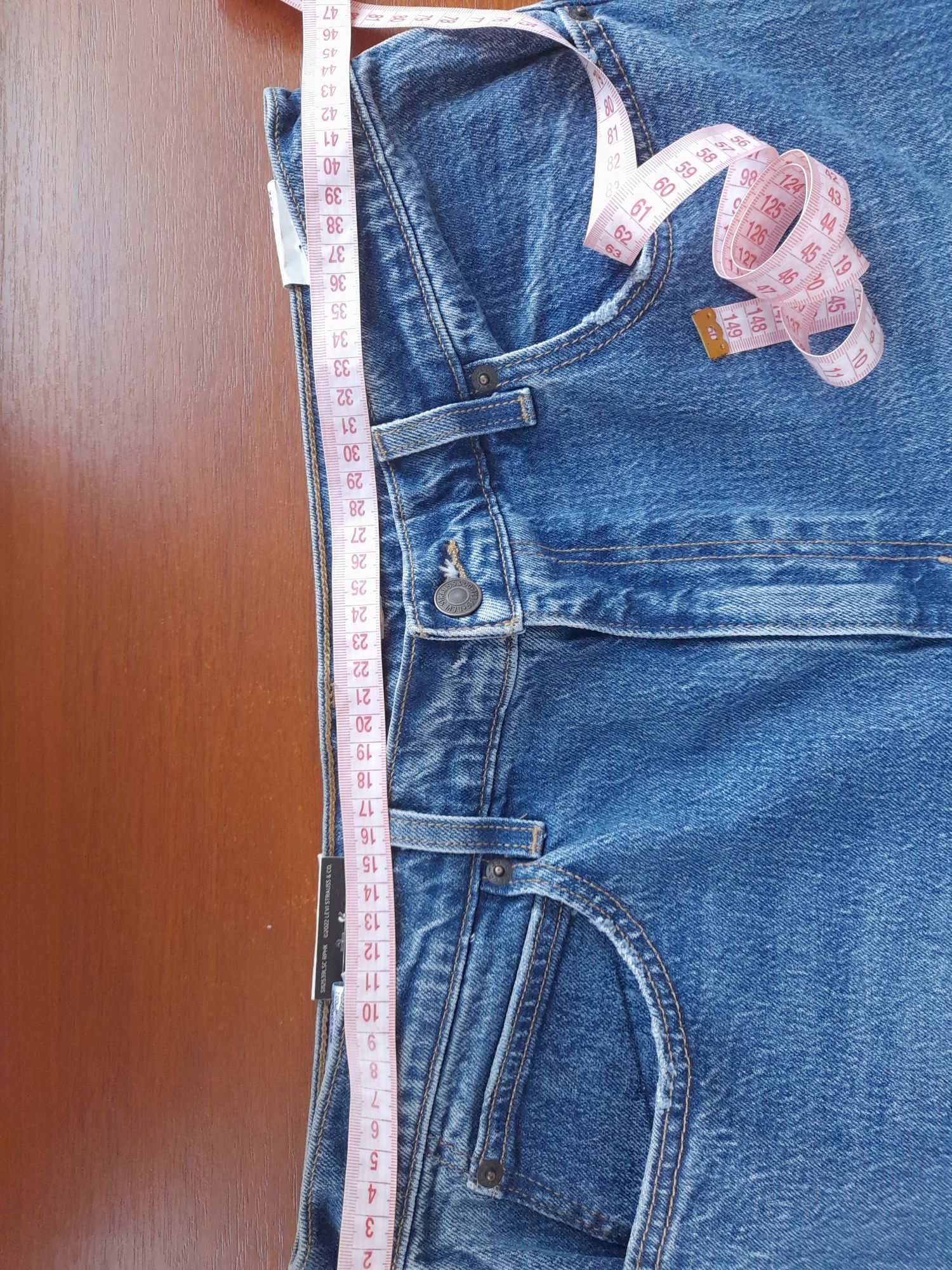 Нові джинси кльош фірми Levi's, 33/32 розмір