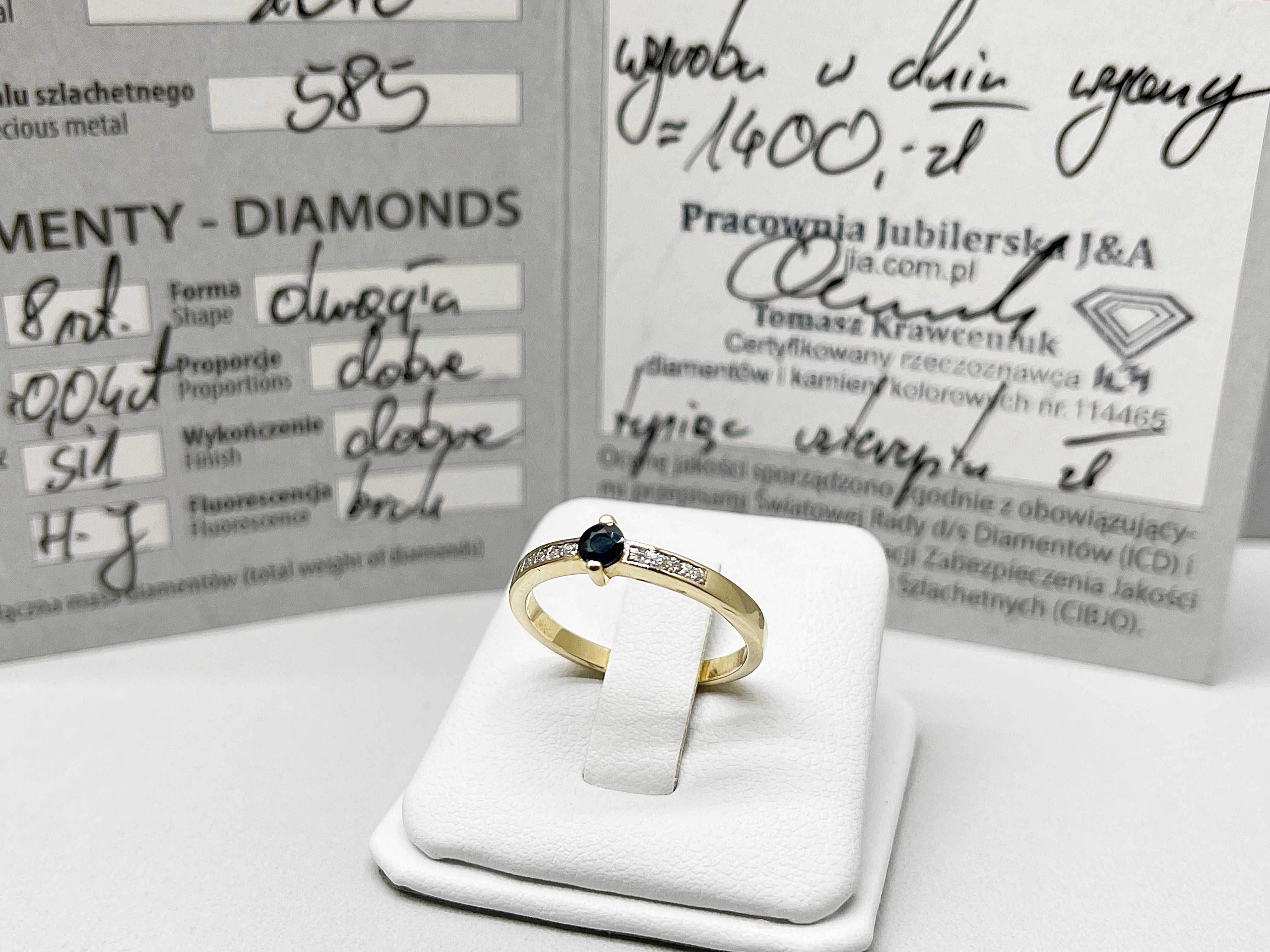 Złoty pierścionek z szafirem 0,23ct i diamentami 0,04ct