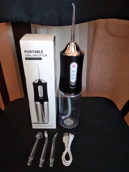 Иригатор портативный для полости рта.