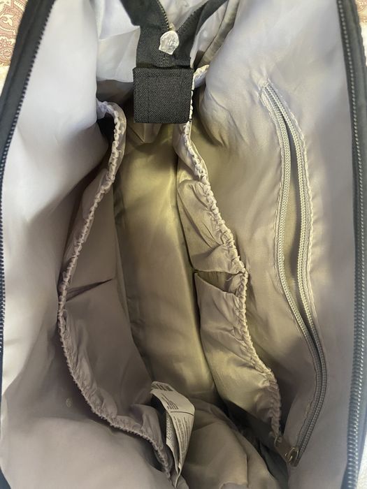 Baby diaper bag in black colour.