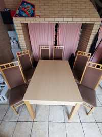 Mesa de jantar, elegante, extensível. Com 6 cadeiras.