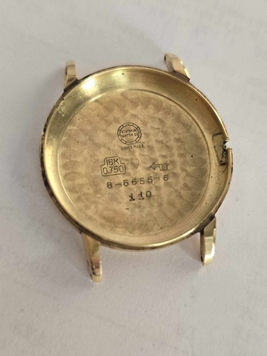 Szwajcarski zegarek Cyma mikrokratka, plaster miodu w 14K złocie
