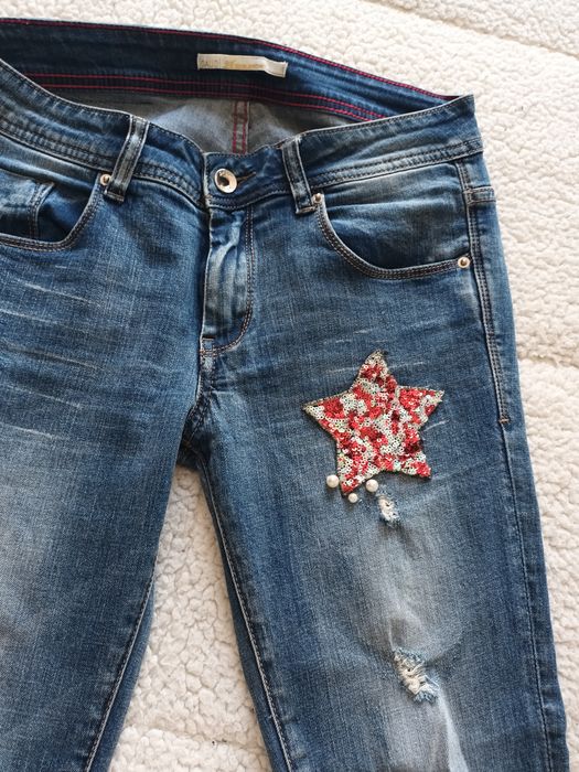 Calças de ganga marca Gaudi