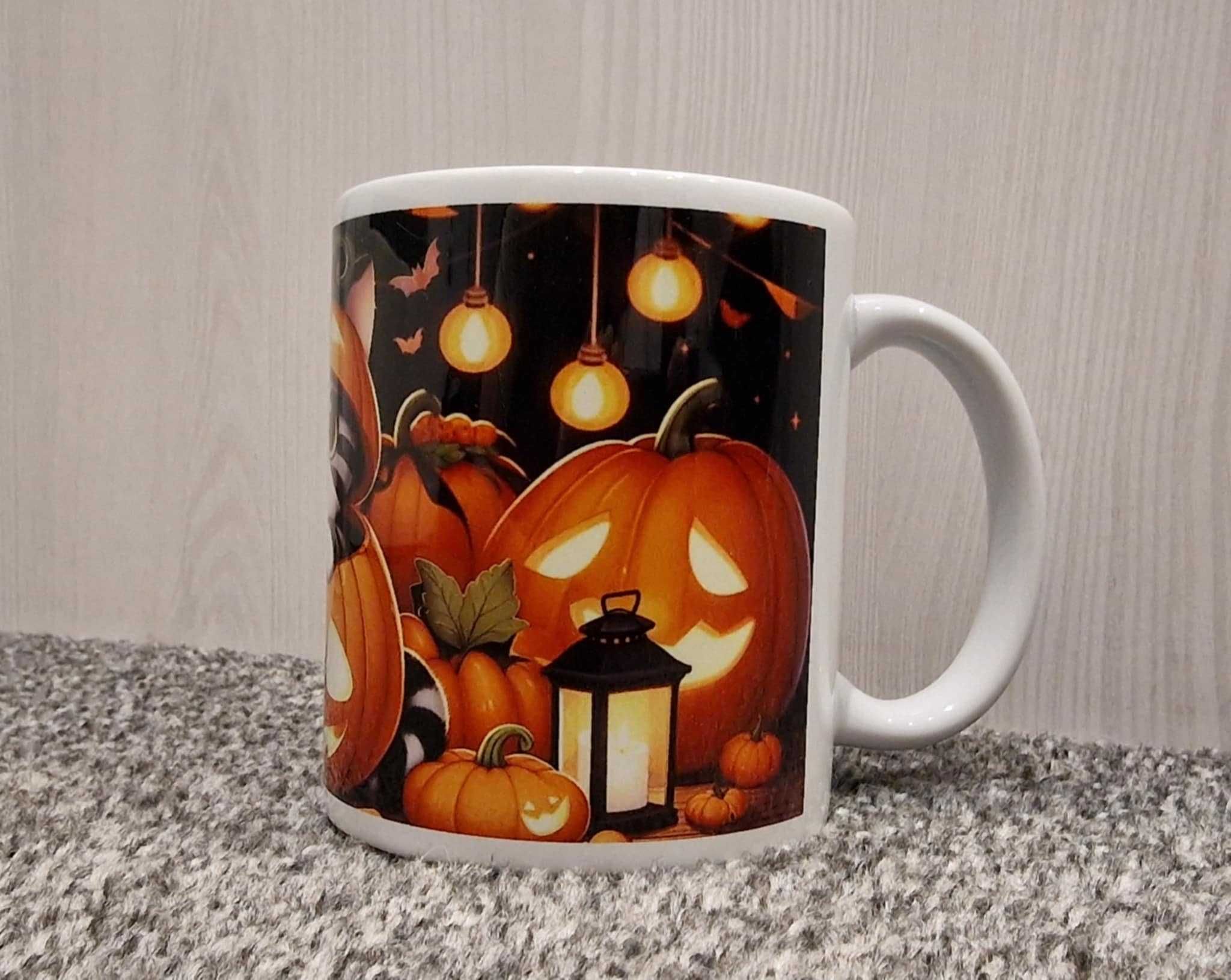 Kubek Halloween słodki kotek w dyni