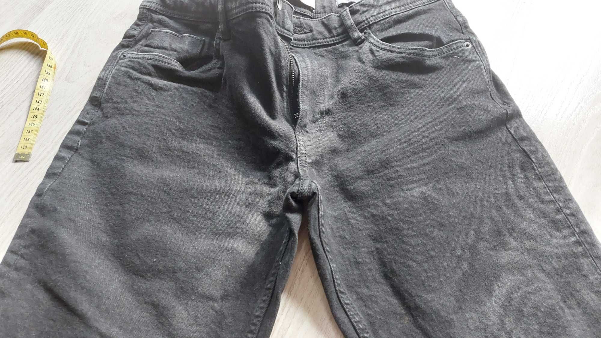 Czarne jeansy Reserved regular 32/34
