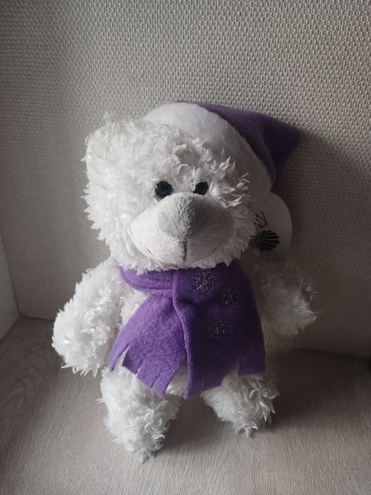 Ведмідь середня ,м'яка  нова іграшка.
