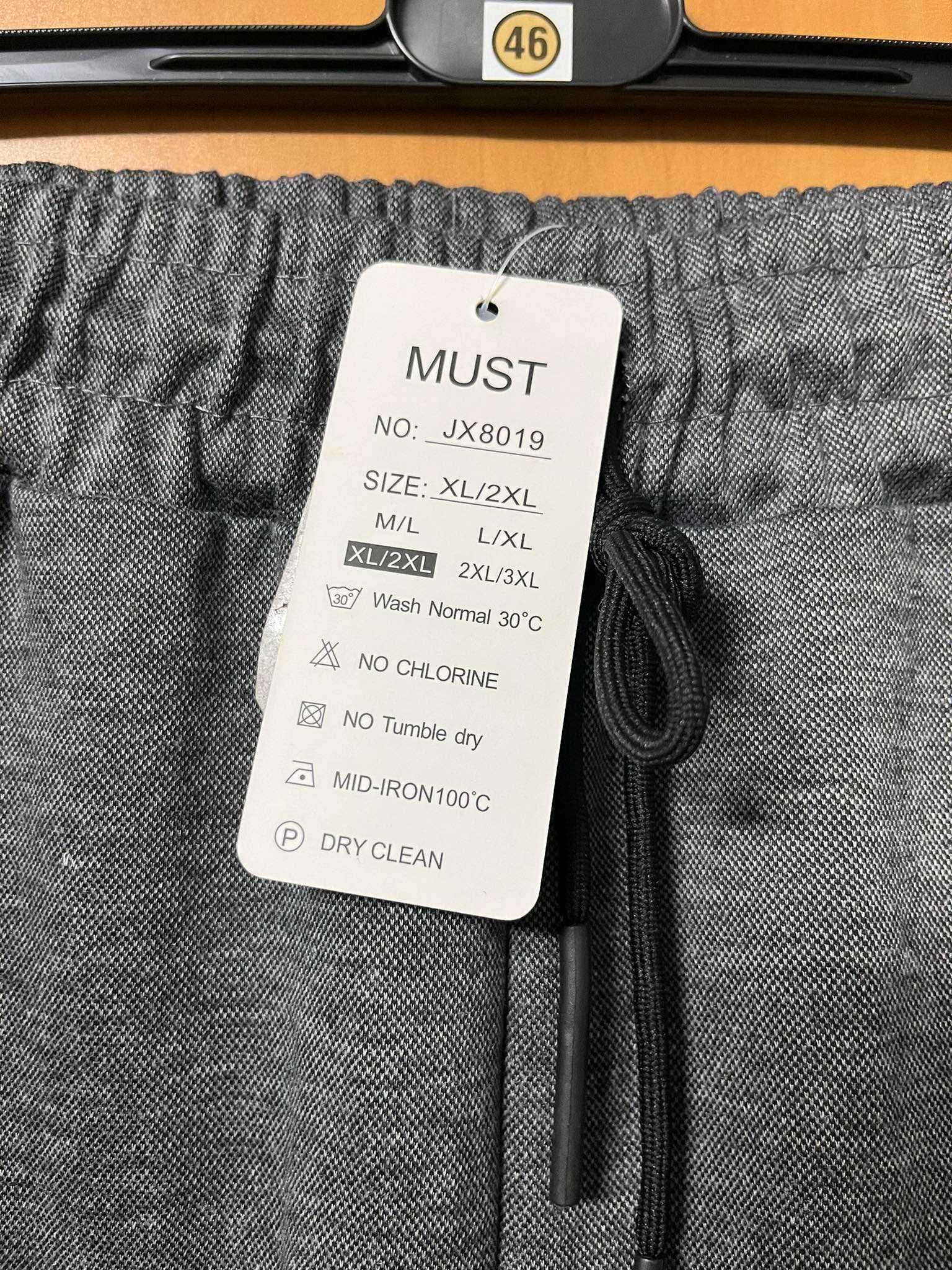 Nowe spodnie dresowe męskie Must - XL/2XL