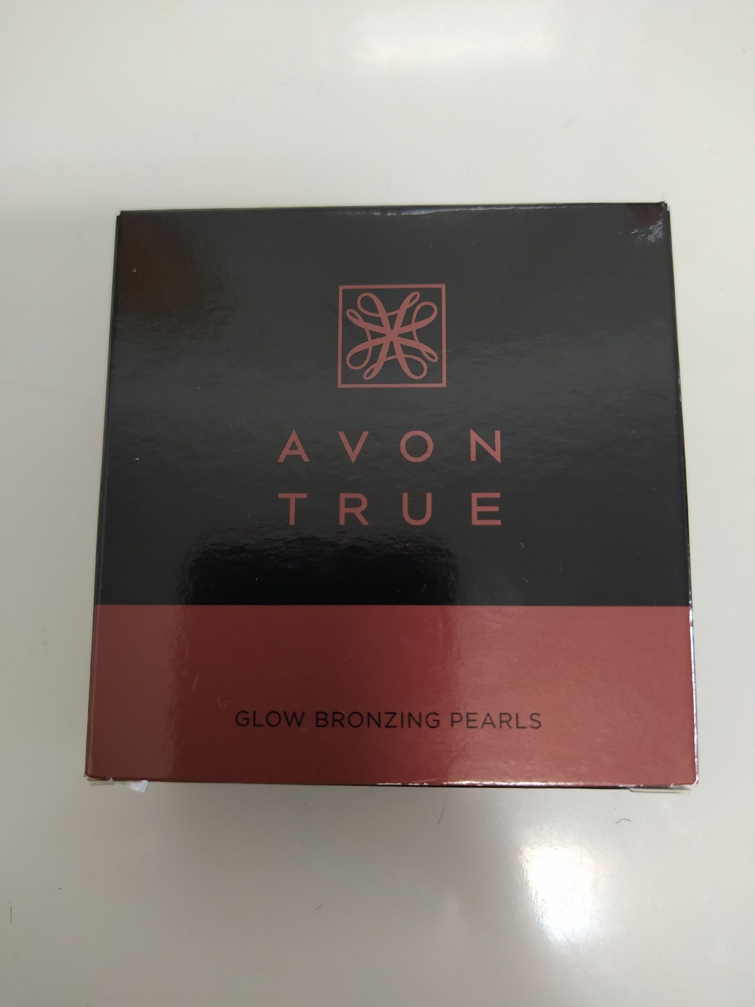 Pérolas bronzeadoras Avon