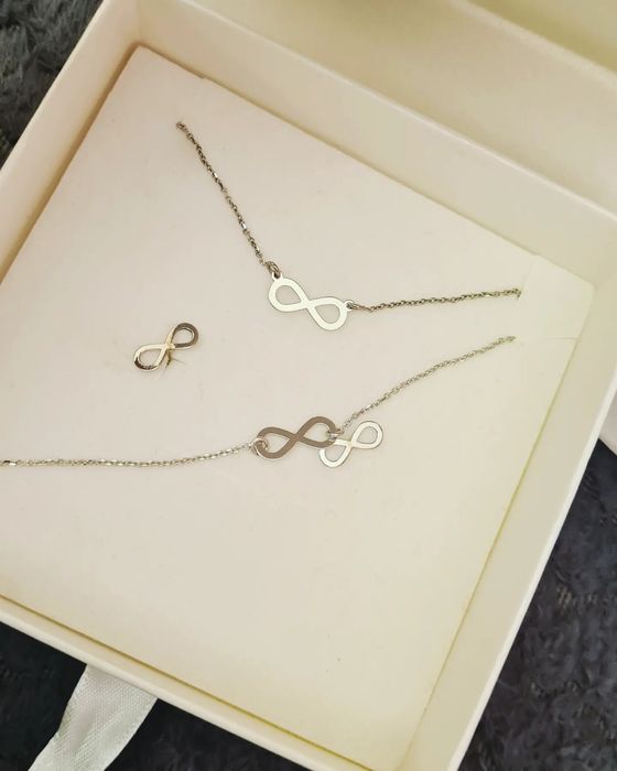 Biżuteria Srebrny komplet briju kolczyki bransoletka łańcuszek znak ni