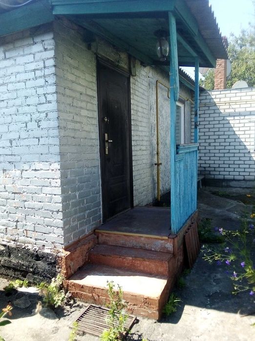 Продам половину будинка в районі Першої міської лікарні